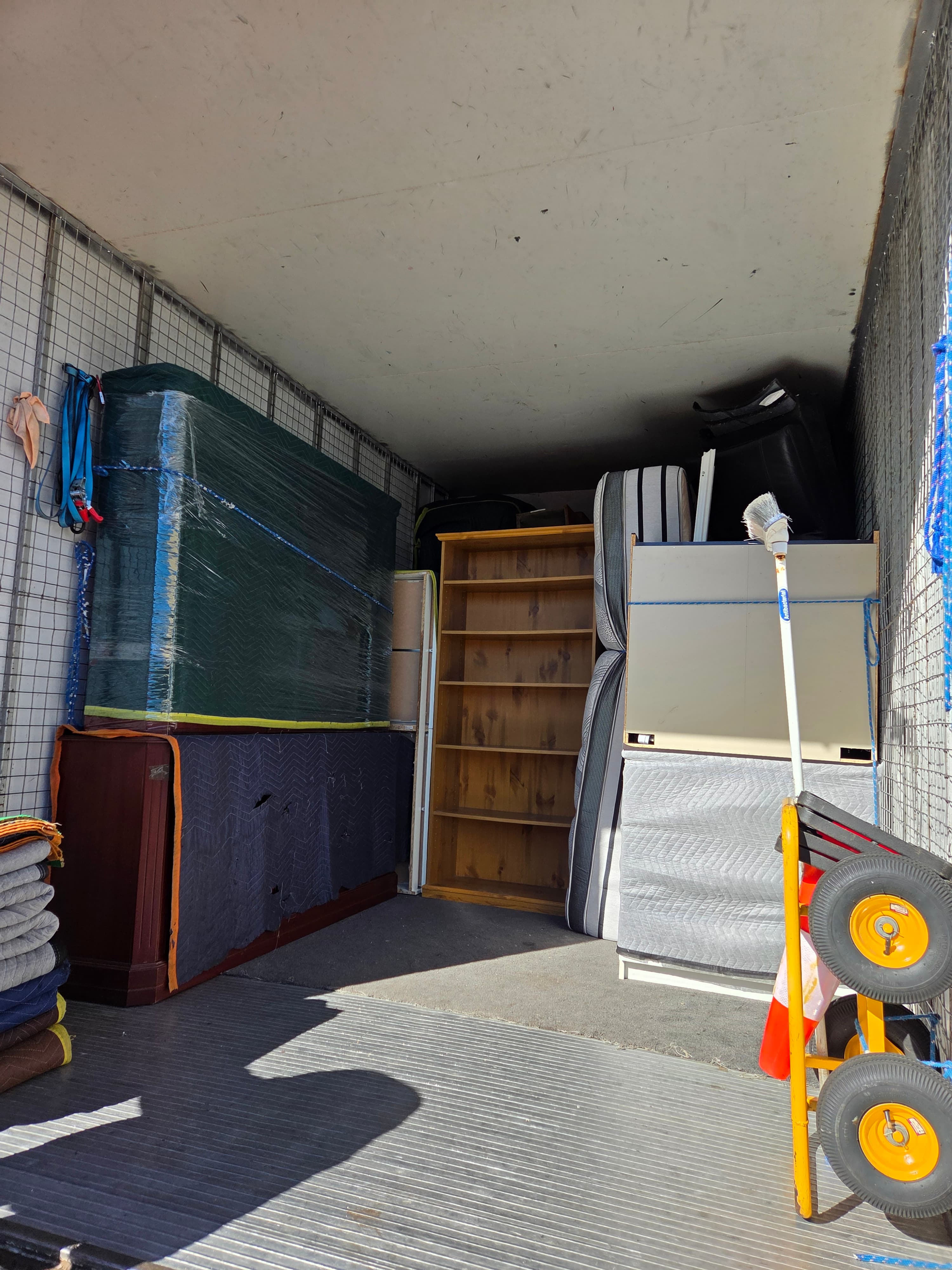 Furniture loaded onto the Awesome Mate Removals truck