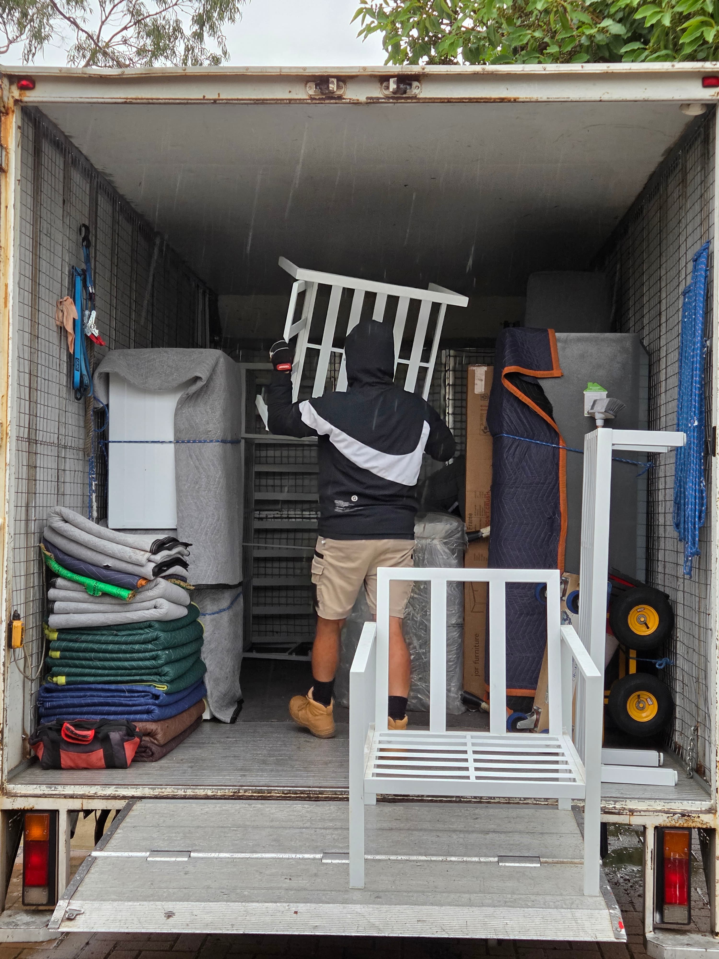 Crew loading home items onto the truck