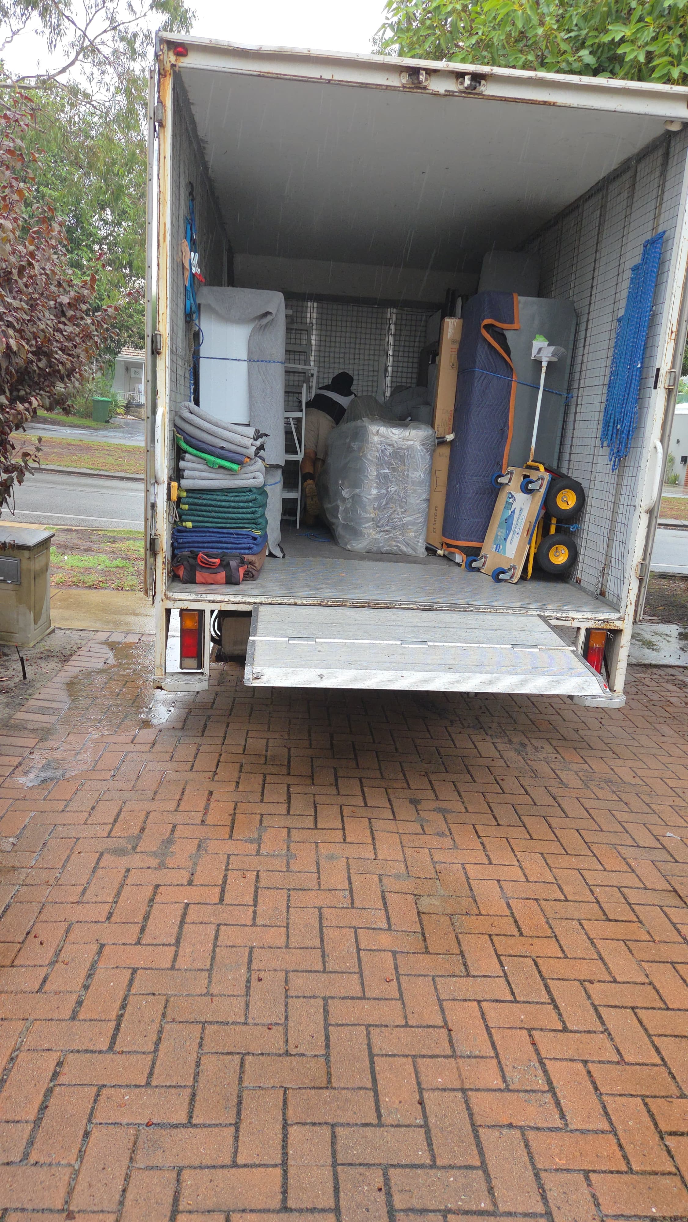 Crew loading home items onto the truck