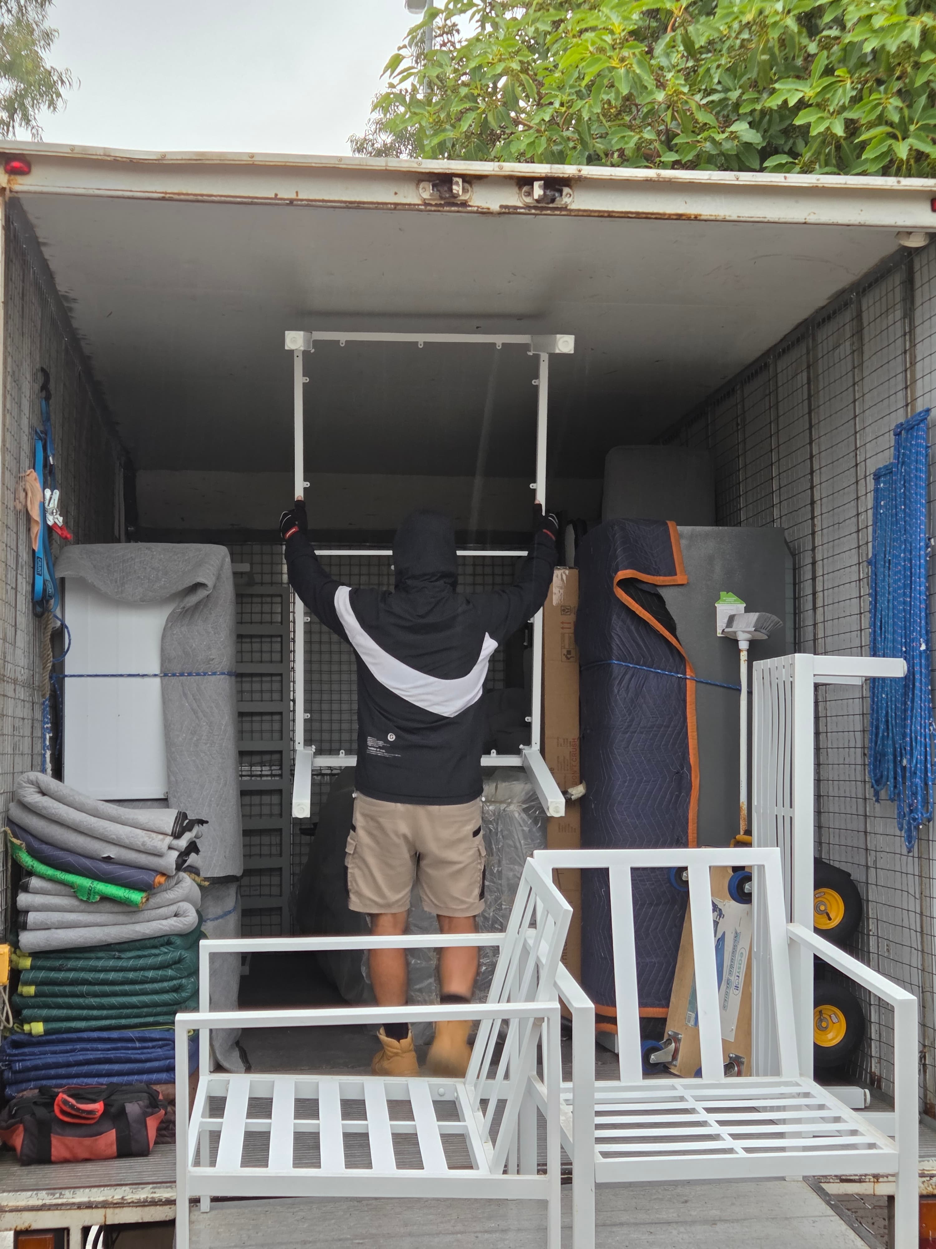 Awesome Mate Removals crew loading furniture onto a truck for a Melbourne to Perth move