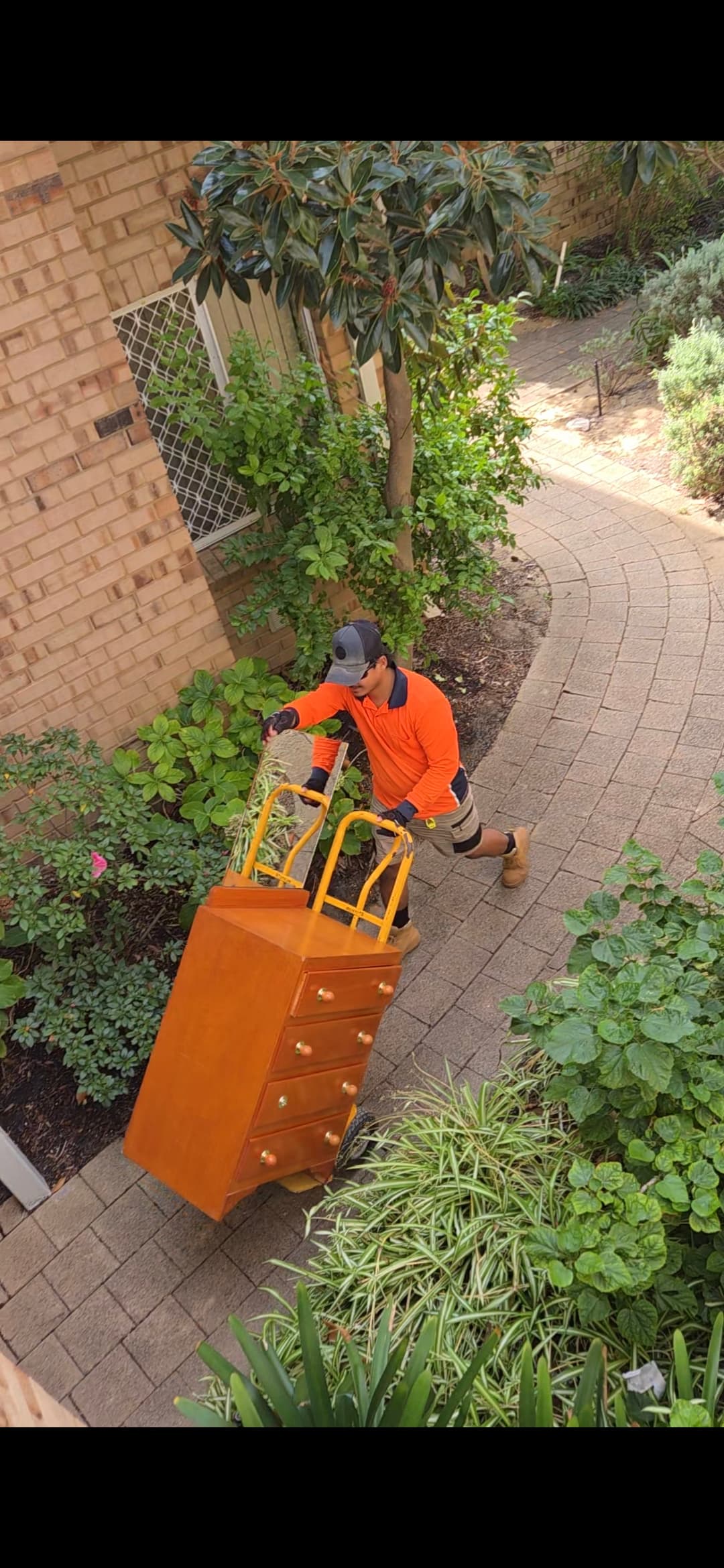 Crew loading furniture during a Perth removal