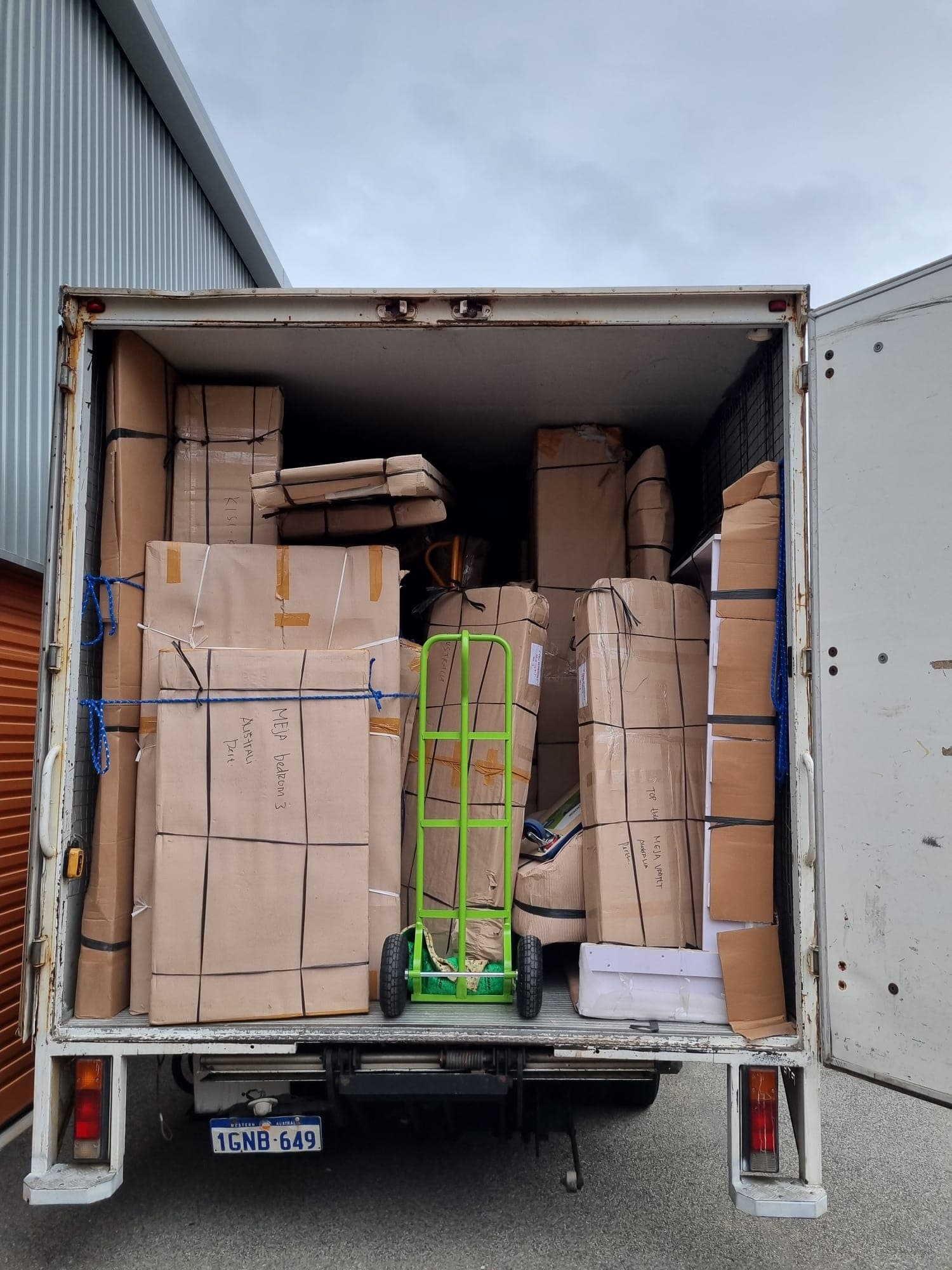 Awesome Mate Removals crew loading furniture