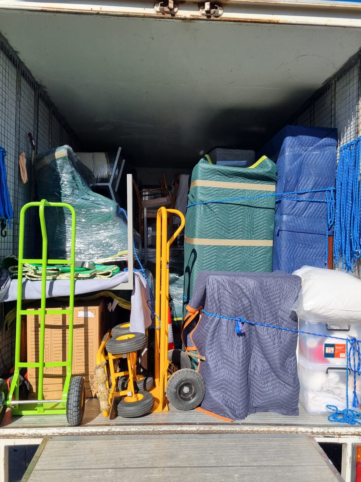 Awesome Mate Removals crew loading old furniture and junk from a Perth property